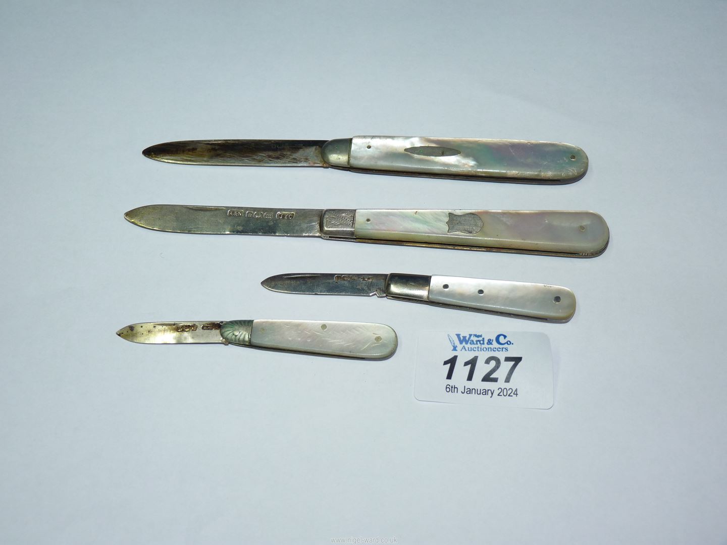 Four Sheffield silver bladed fruit knives with Mother of Pearl handles, various dates.