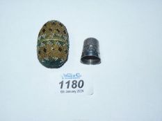 A French bead thimble case with silver thimble.