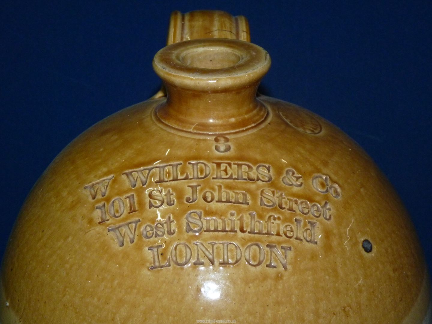 A stoneware flagon marked W. Wilder, London, 17'' tall. - Image 2 of 2