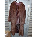 A lady's Mink coat by Augustus Edwards, Hereford together with a mink stole.