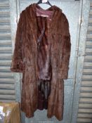 A lady's Mink coat by Augustus Edwards, Hereford together with a mink stole.