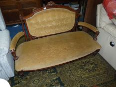 A most elegant Edwardian Mahogany/Satinwood framed two seater Sofa having swept arms,