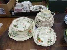 An Alfred Meakin 'Marigold, Astoria Shape' part dinner service to include five dinner plates,