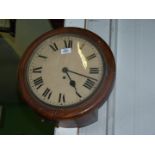 A Mahogany cased single fusee movement circular Wall clock having a cream face with Roman numerals,