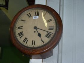 A Mahogany cased single fusee movement circular Wall clock having a cream face with Roman numerals,