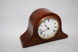 An attractive Mahogany/Walnut cased Mantel Clock of compact dimensions with inlaid decoration,