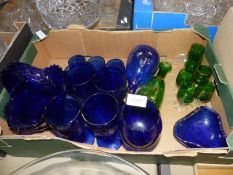 A quantity of coloured glass including blue tumblers, green sherry decanter and glasses,