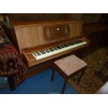 A Walnut and other woods "Challen 933"upright Piano,