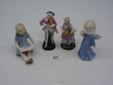 Four small china figures including a pair of musicians, an angel and a little girl reading.