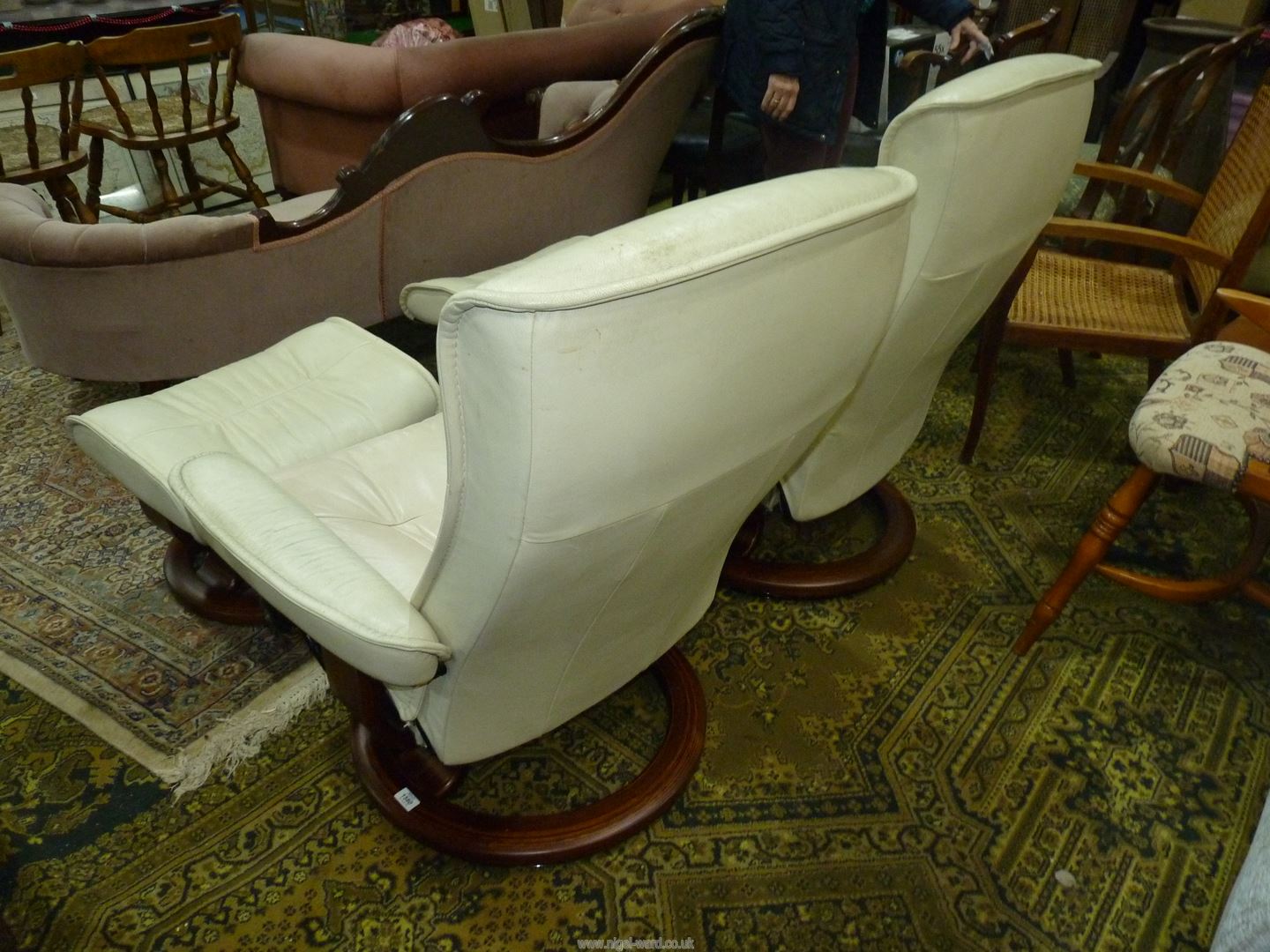A pair of cream upholstered Ekornes Stressless reclining Armchairs complete with the associated - Image 2 of 4