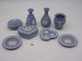 Eight pieces of pale blue Wedgwood Jasperware to include three vases, two boxed and pin trays.
