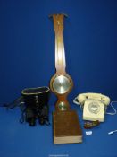 A quantity of miscellanea including barometer, dial telephone, 8 x 40 cased binoculars,