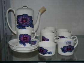 A Wedgwood Susie Cooper 'Anemone' design part coffee set, one saucer a/f.