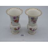 A pair of Dresden hand painted floral vases, some chips, 6 1/4'' tall.