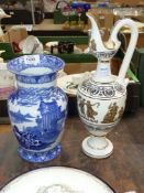 A Cauldon ware blue and white vase and a Lambrou Bros. Greek ewer jug with 24k gold decoration.