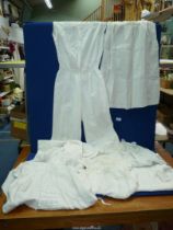 A quantity of vintage cotton and lace undergarments and gowns to include lady's 'one piece' and a