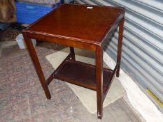 A square dark oak Occasional Table, the legs united by lower shelf,