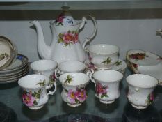 A six setting Royal Albert Prairie Rose coffee set, (mostly seconds) one cup broken handle.