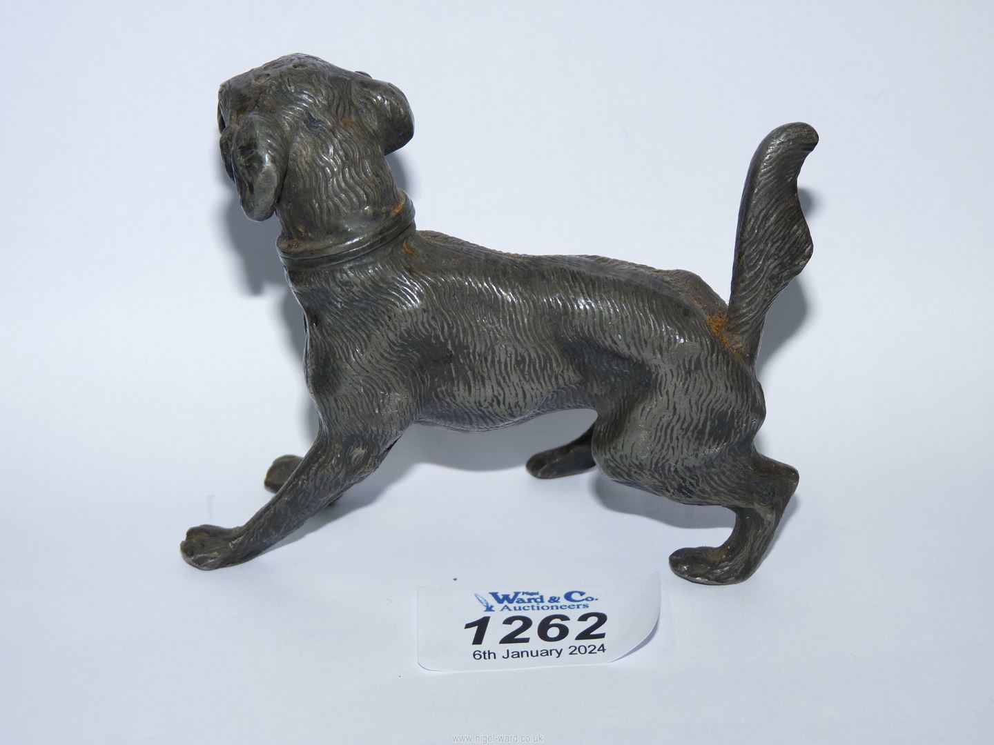 An unusual cast metal pepper pot in the form of a dog, 3 1/4" high x 5" long. - Image 2 of 3