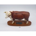 A Beswick Connoisseur model of a Hereford Bull on plinth.