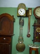 An unusual two train upright driven movement Wall CLock having a domed 8 1/4'' diameter white