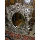 A contemporary moulded Wall Mirror of foliate and floral design,