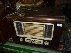 An 'His Master's Voice' cased Radio (veneer a/f), 19 1/2" x 14 1/4" x 10 1/4".