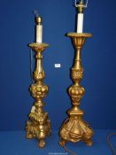 Two moulded gilt Torchere/lamp bases, one on scroll feet,