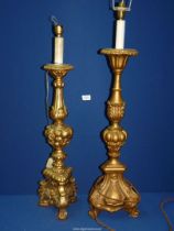 Two moulded gilt Torchere/lamp bases, one on scroll feet,
