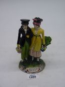 A Staffordshire pottery Bocage type figure of Dandies, 7'' tall.