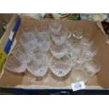 A quantity of wine, sherry and whisky glasses.