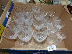 A quantity of wine, sherry and whisky glasses.