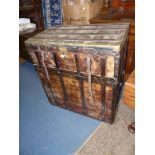 An unusual large metal strap bound Trunk with brass strip details,