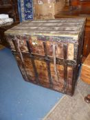 An unusual large metal strap bound Trunk with brass strip details,