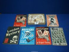 A small quantity of seashells and six 'London Mystery' books.