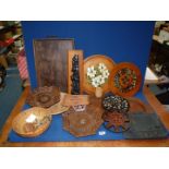 A quantity of treen to include fruit baskets, platters, carving of totem, etc.