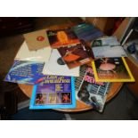 A basket of old records including classical and other LP's, singles including Cliff Richard, etc.