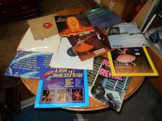 A basket of old records including classical and other LP's, singles including Cliff Richard, etc.