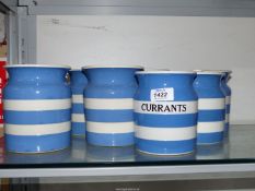 A set of nine Cornishware blue and white stripe Storage Jars, including "Currants" and "Rice" named,