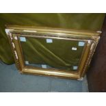 A large period gilt frame with glass, some restoration needed,