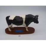 A Beswick Connoisseur model of a Friesian Bull on plinth,