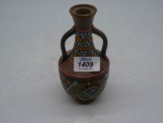 A Sarreguemines vase, yellow, blue and green with zig zag pattern, 6 1/4" tall.