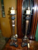 A pair of table Lamp bases with reeded columns and pineapple style detail with a triple effect base