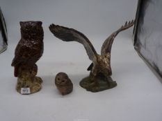 Three pottery birds including an owl, eagle and a Poole pottery owl.