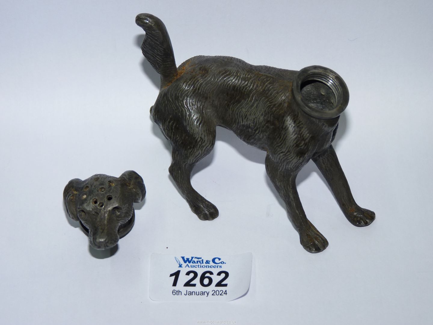 An unusual cast metal pepper pot in the form of a dog, 3 1/4" high x 5" long. - Image 3 of 3