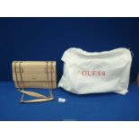 A 'Guess 1981' faux crocodile skin handbag in nude colour, with chain handles and dust bag.