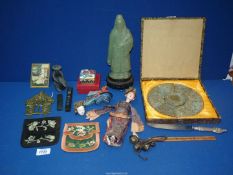 A quantity of Oriental items including purses, whistle, figure (a/f), bells, china head, etc.