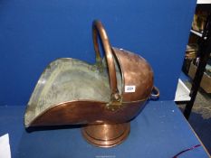 A large copper coal scuttle, 21'' long x 15 1/2'' high.