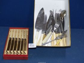A quantity of loose cutlery, cake slice, etc. plus six stainless steel dinner knives, boxed.
