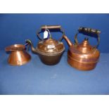 A 19th century copper kettle and an Art Deco copper jug.